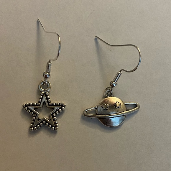 Jewelry - mismatched star and planet saturn earrings